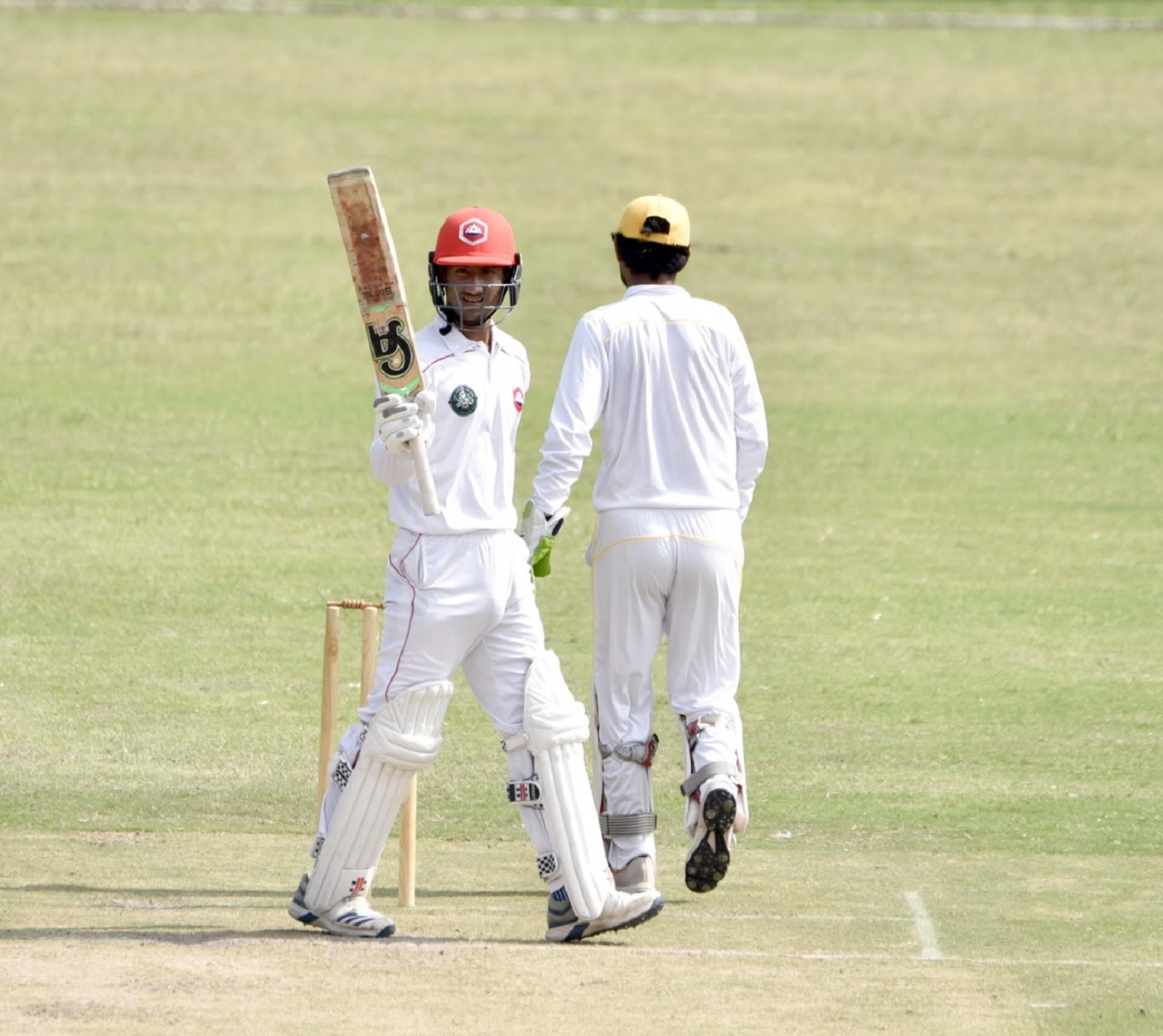 Rohail Nazir celebrates his half-century, cricket milestone photo, hd pics