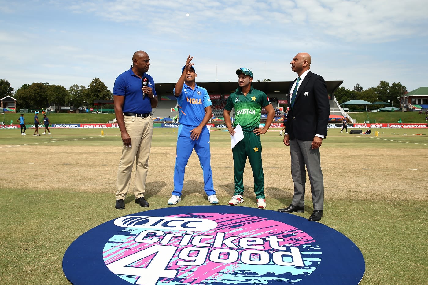 Priyam Garg tosses the coin as Rohail Nazir looks on, match start cricket photo