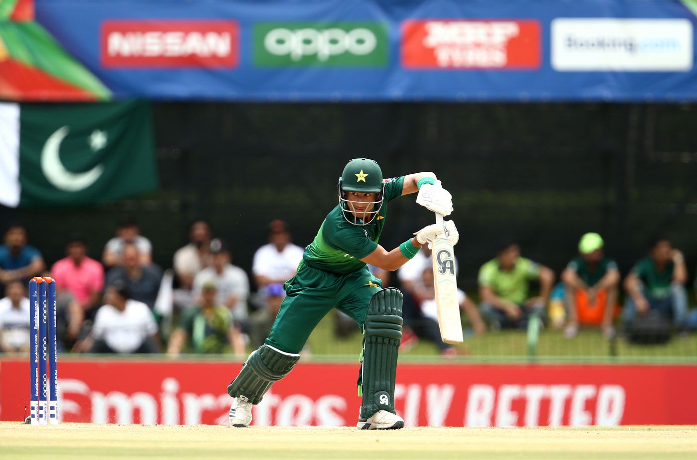Rohail Nazir drives through the off side, cricket batting hd photo