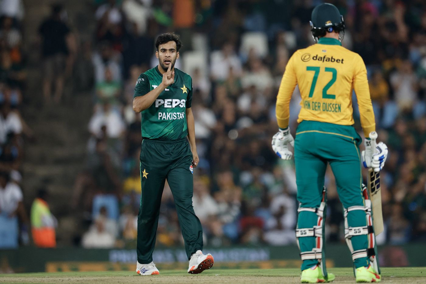 Rassie van der Dussen uses DRS to overturn a decision off Abbas Afridi's bowling in the ninth over, cricket action photo, hd pics