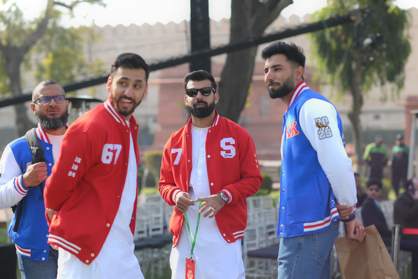 Salman Agha, Shadab Khan and Irfan Khan chat on the sidelines of the PSL draft, cricket event photo