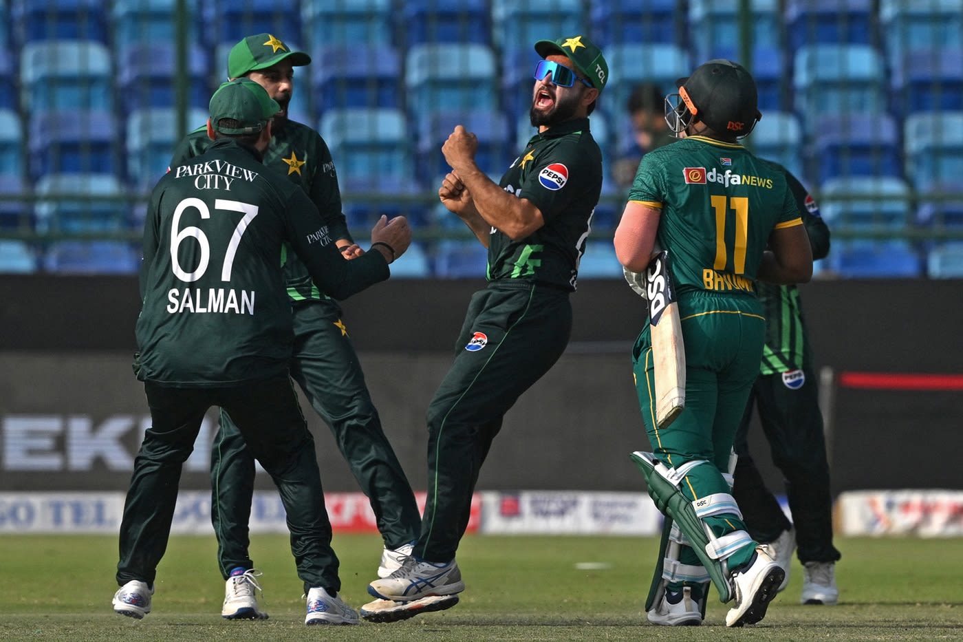 Salman Agha, Saud Shakeel and Kamran Ghulam celebrated Temba Bavuma's run out wildly, team celebration wallpaper