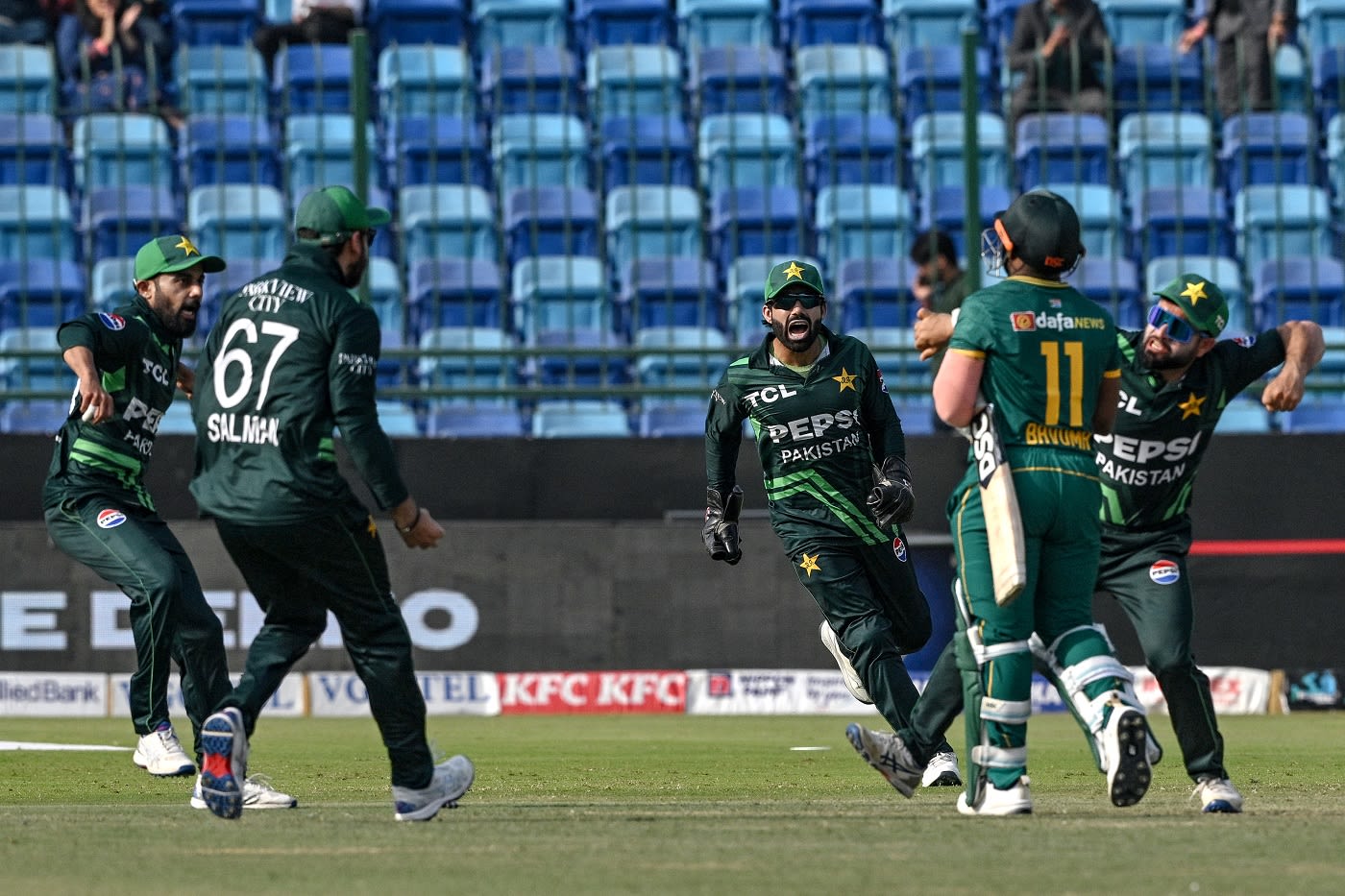Saud Shakeel, Salman Agha, Mohammad Rizwan and Kamran Ghulam celebrate wildly after Temba Bavuma is run out, team celebration cricket photo, hd pics