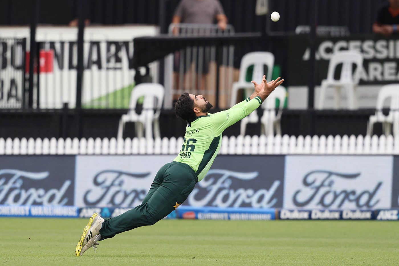 Tayyab Tahir couldn't quite reach a diving attempt in the outfield, cricket fielding action pic
