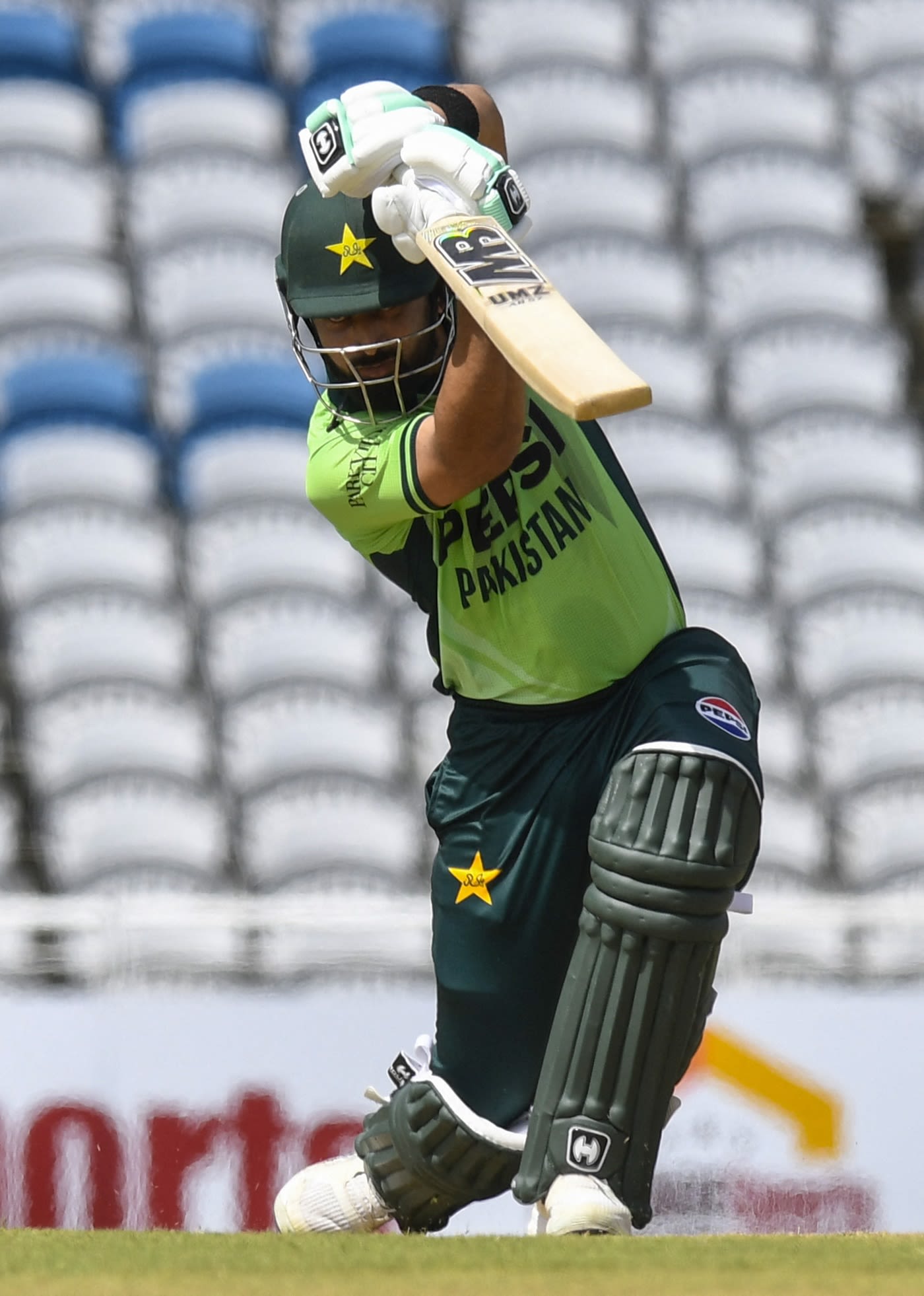 Abdullah Shafique punches with a high elbow, cricket batting photo