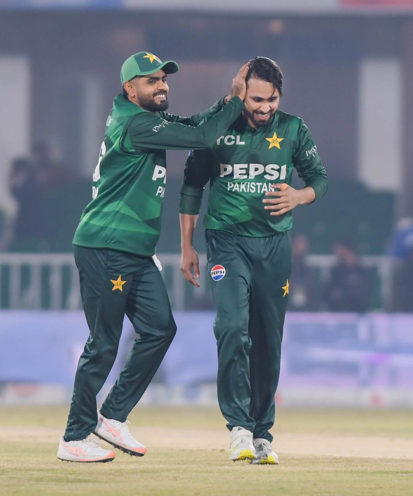Babar Azam ruffles some joy into wicket-taker Faheem Ashraf's hair, celebration cricket pic, hd pics
