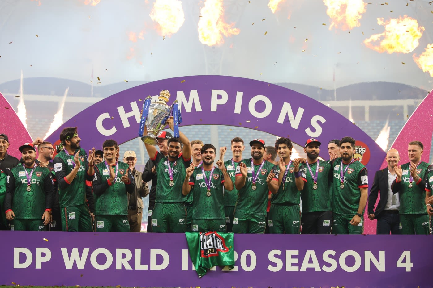 The victorious Desert Vipers team hold the trophy aloft, cricket champions wallpaper pic