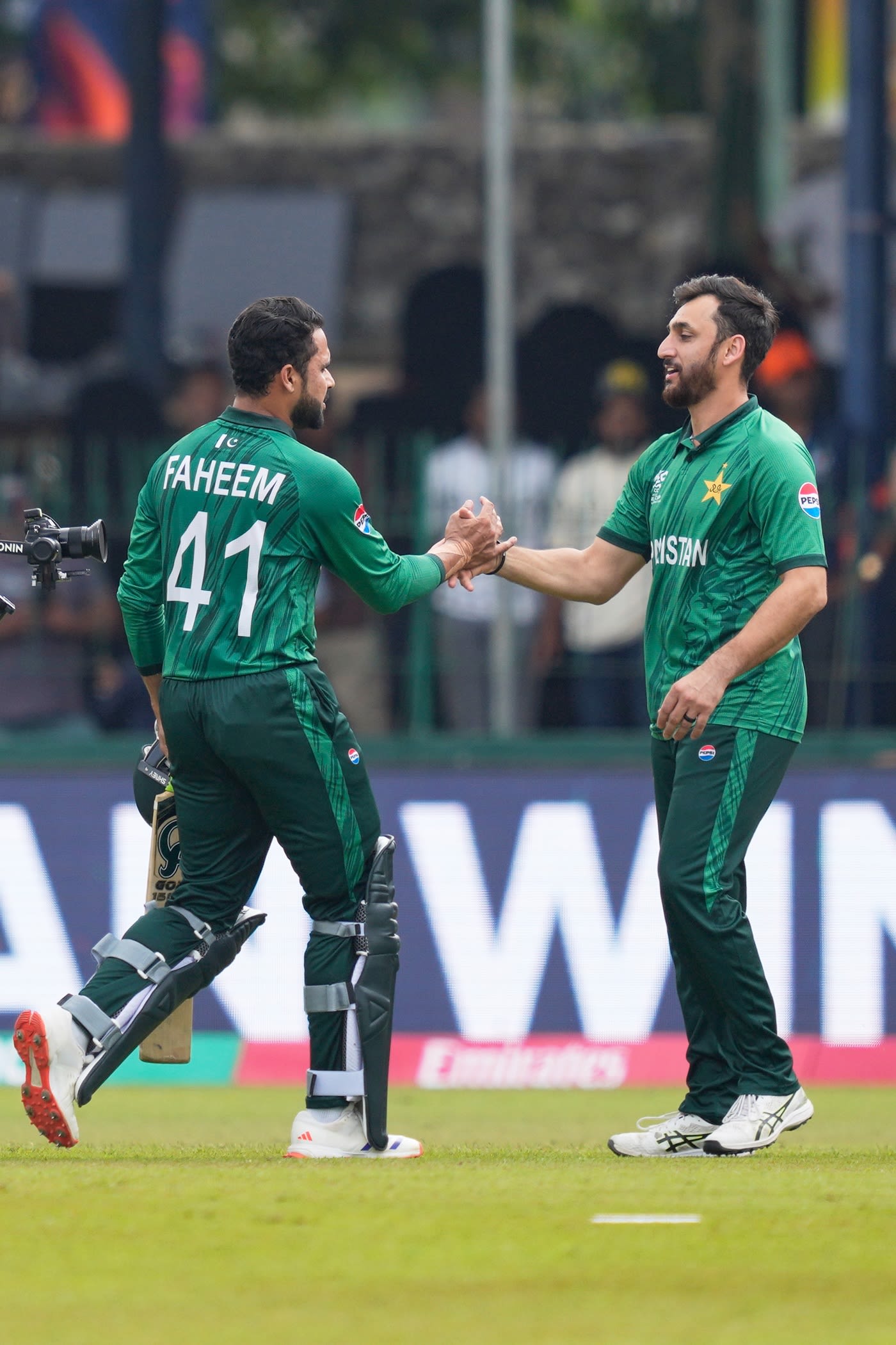 Faheem Ashraf is greeted by Salman Agha after the win, cricket team hd pics