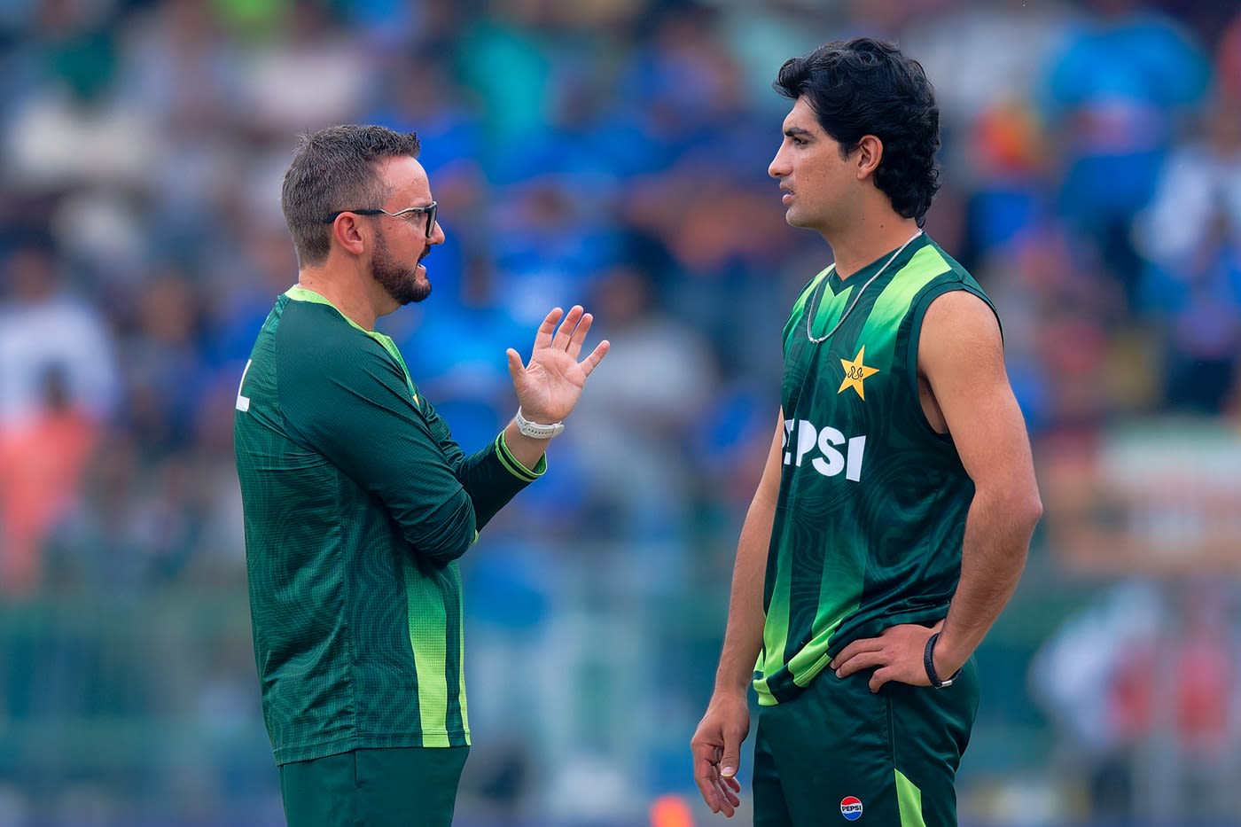 Mike Hesson chats to Naseem Shah, cricket coach and player hd pics