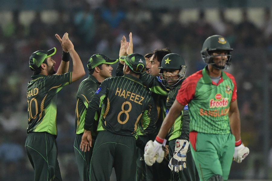 Saeed Ajmal celebrates the wicket of Mahmudullah
