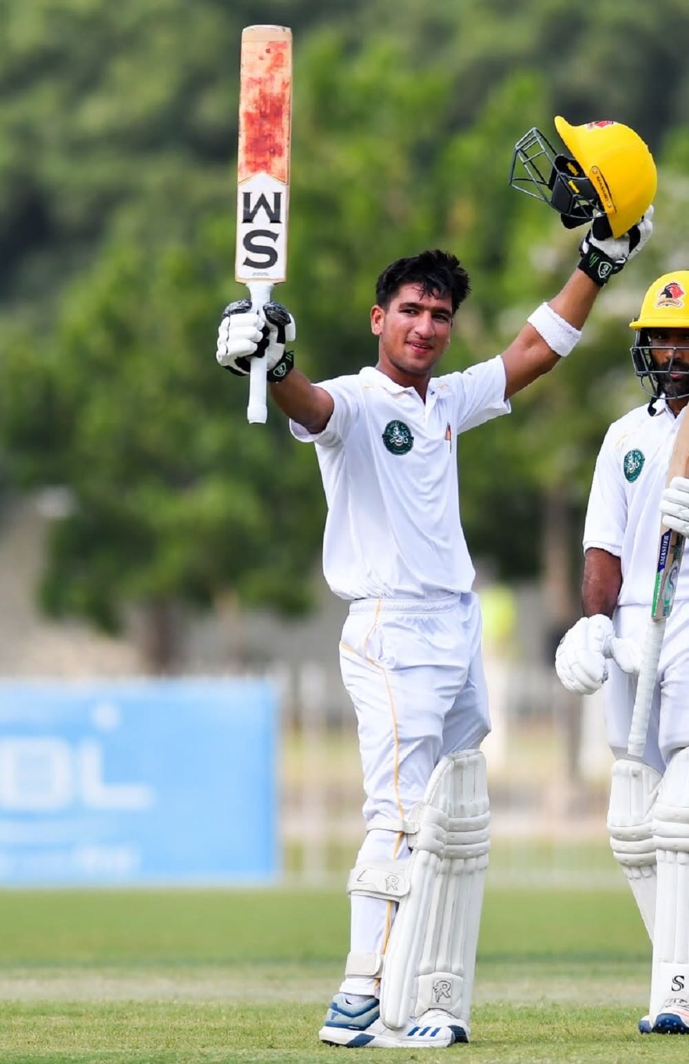 Sindh opener Omair Bin Yousuf celebrates his century