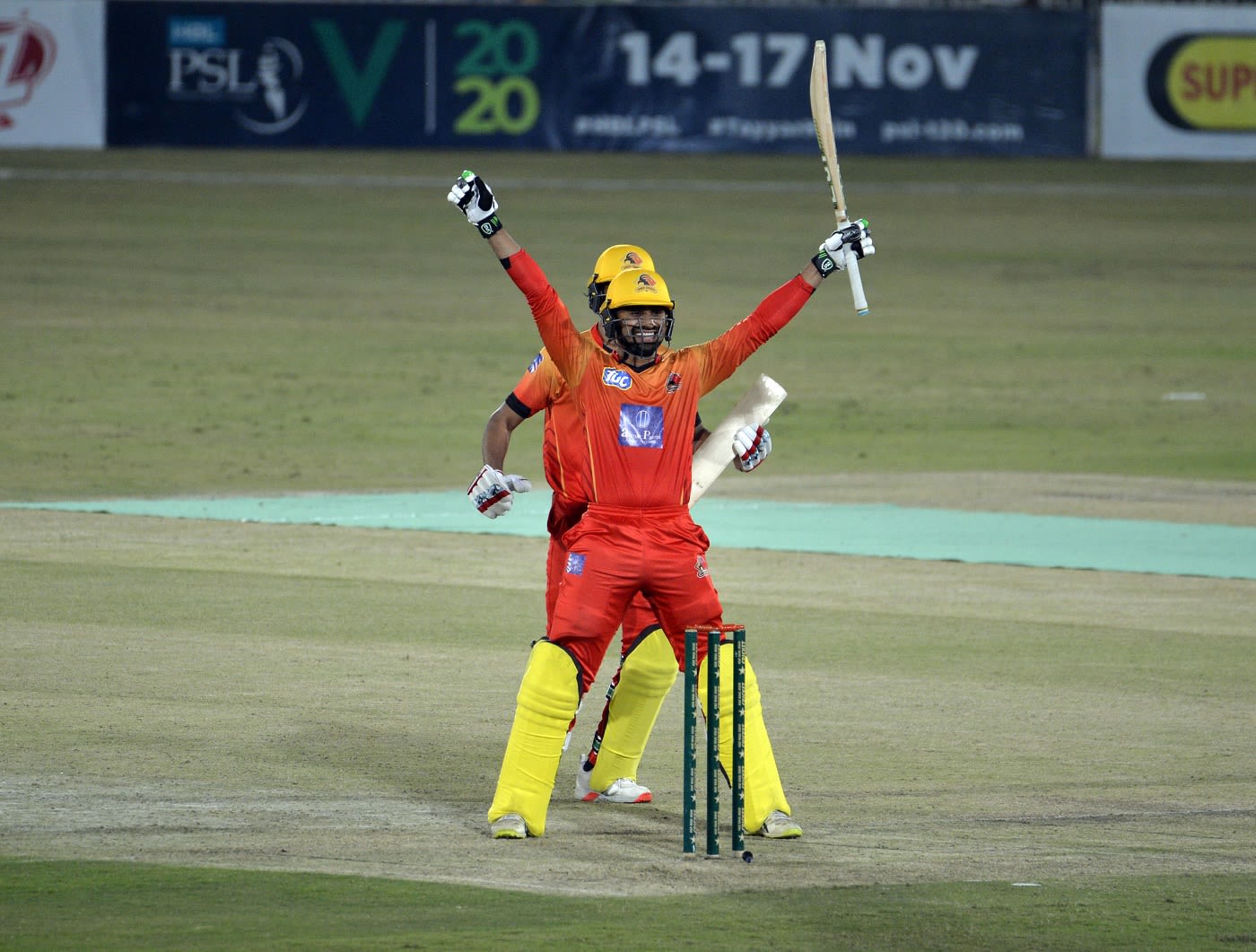 Danish Aziz celebrates after hitting a match-winning last-ball six