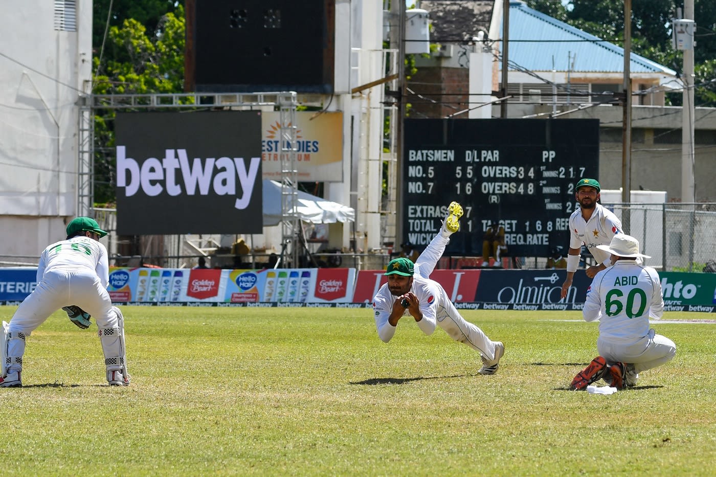Imran Butt pouches one after diving in front of first slip