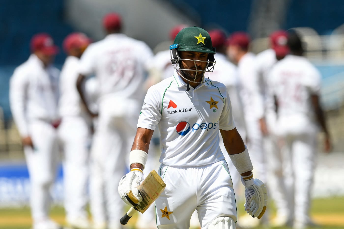Imran Butt walks off, dissmised for a cheap score