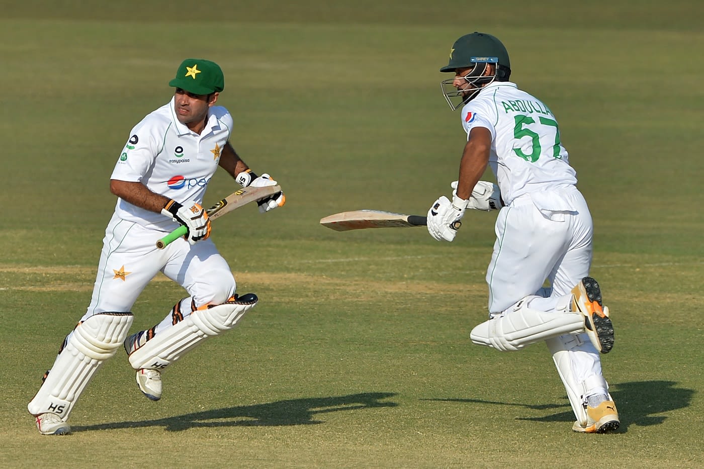 Abid Ali and Abdullah Shafique run between the wickets