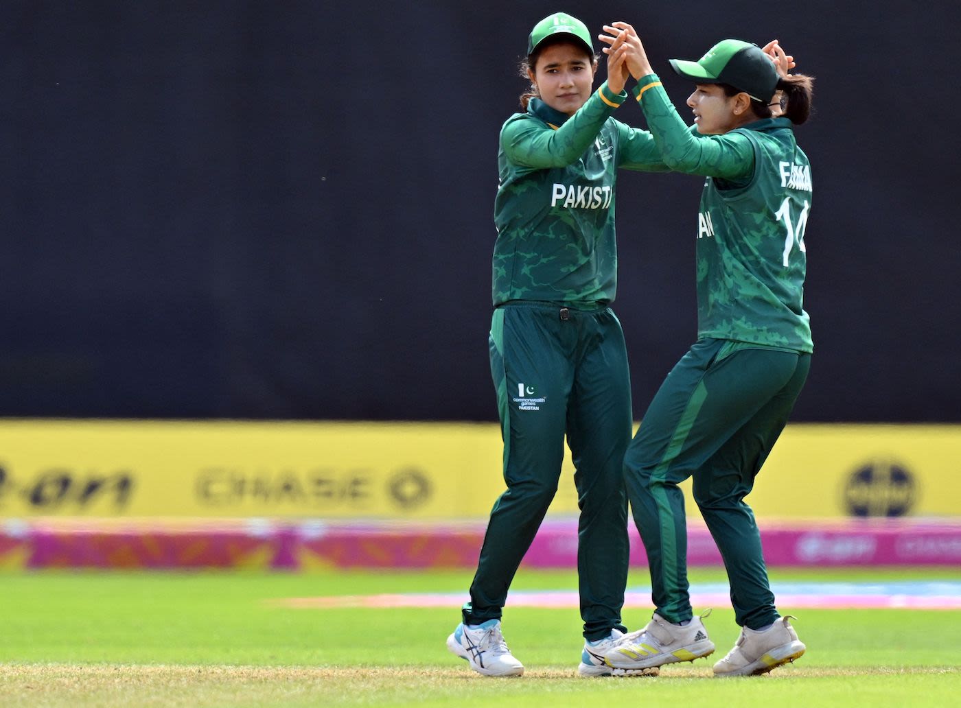 Tuba Hassan is congratulated by Fatima Sana after breaking the opening stand