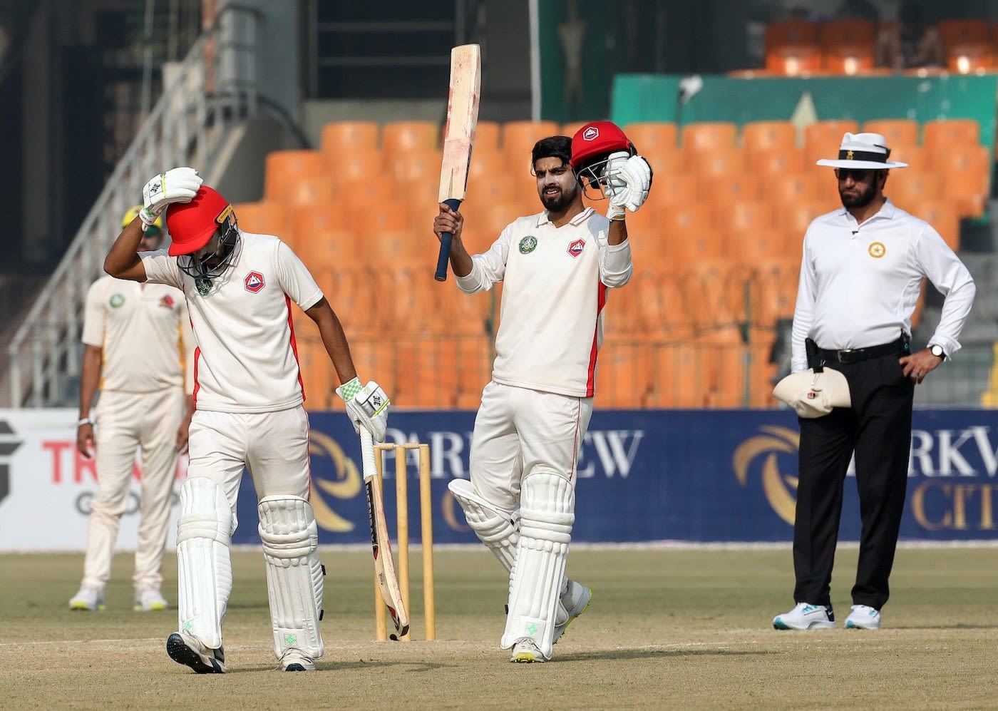 Umar Amin played a captain's innings, scoring a century