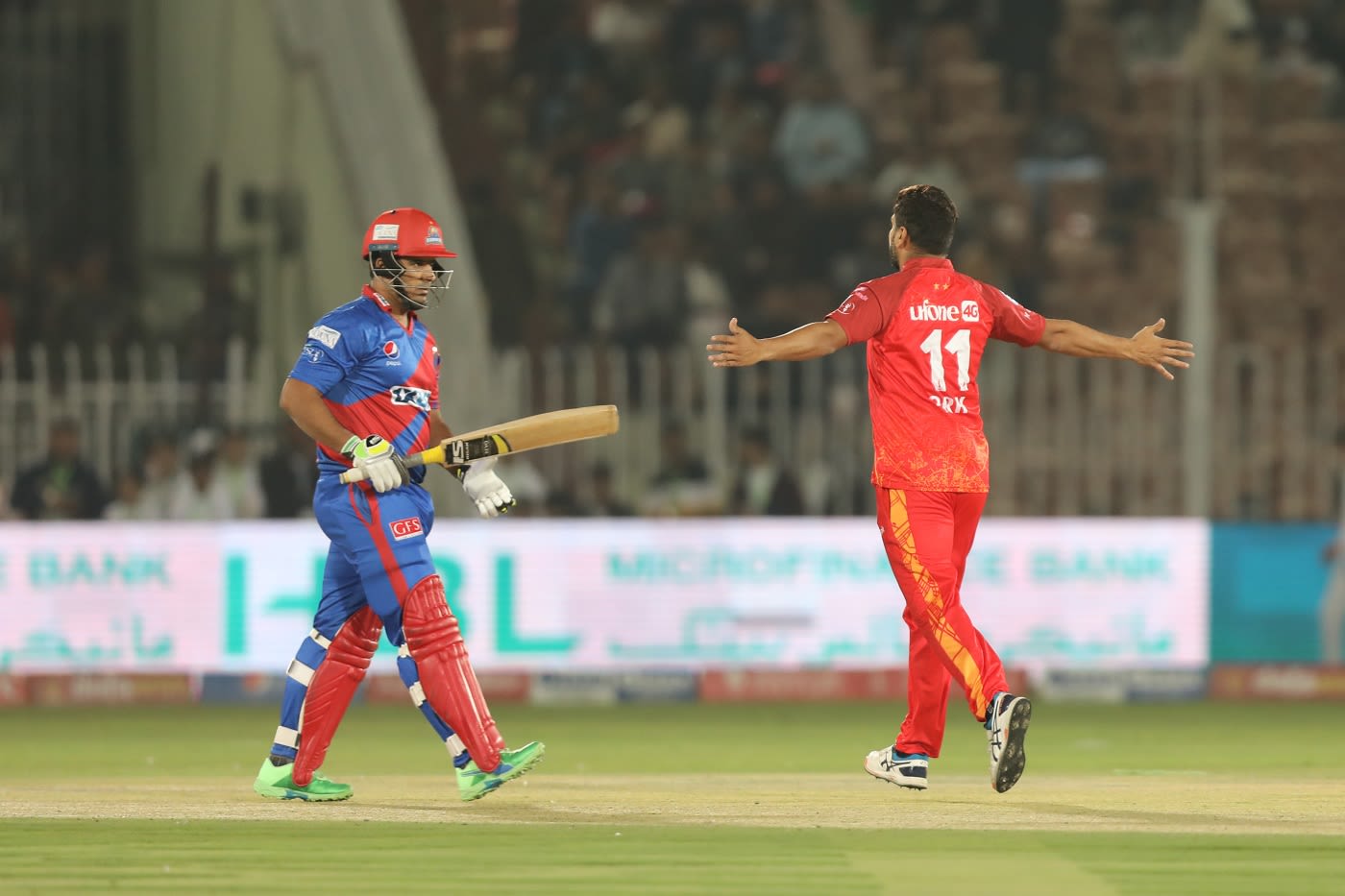 Rumman Raees celebrates the wicket of Sharjeel Khan