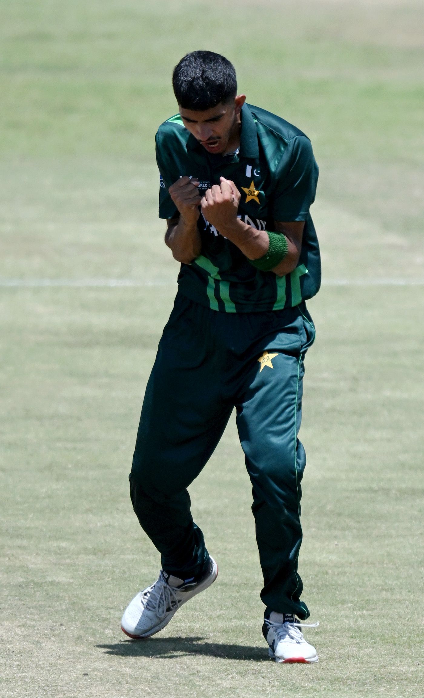 Ali Asfand celebrates after taking the wicket of Sam Clode