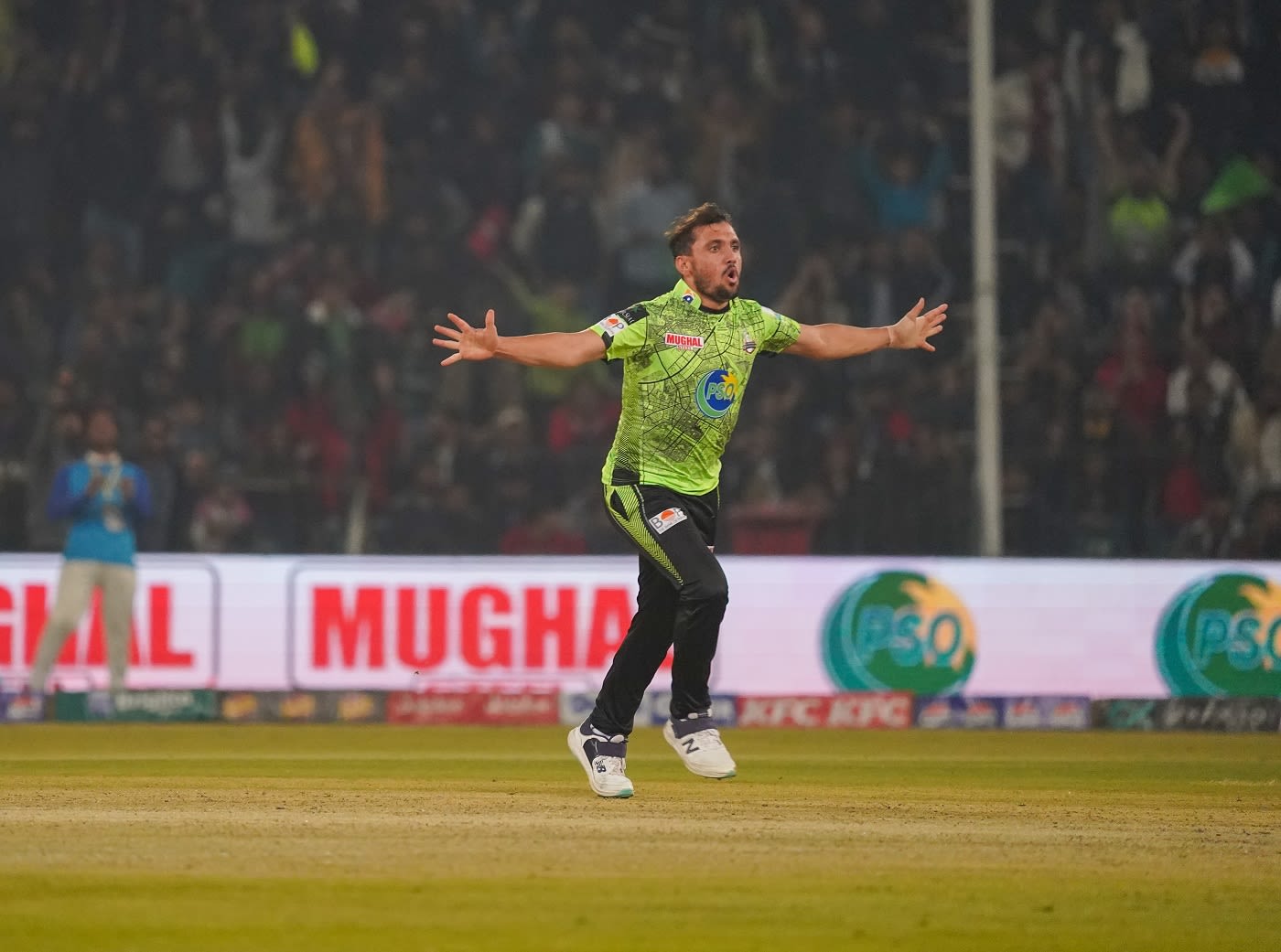 Zaman Khan celebrates the wicket of Mohammad Nawaz