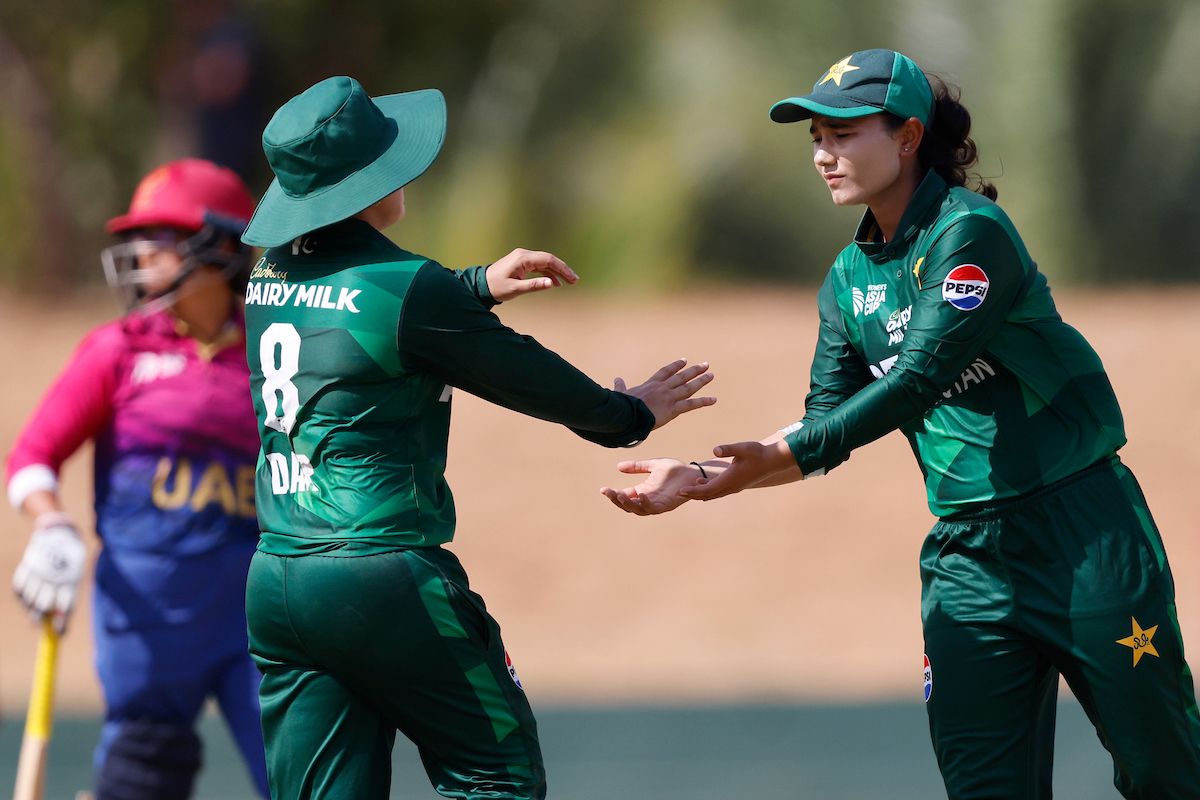 Tuba Hassan celebrates a wicket with her captain Nida Dar