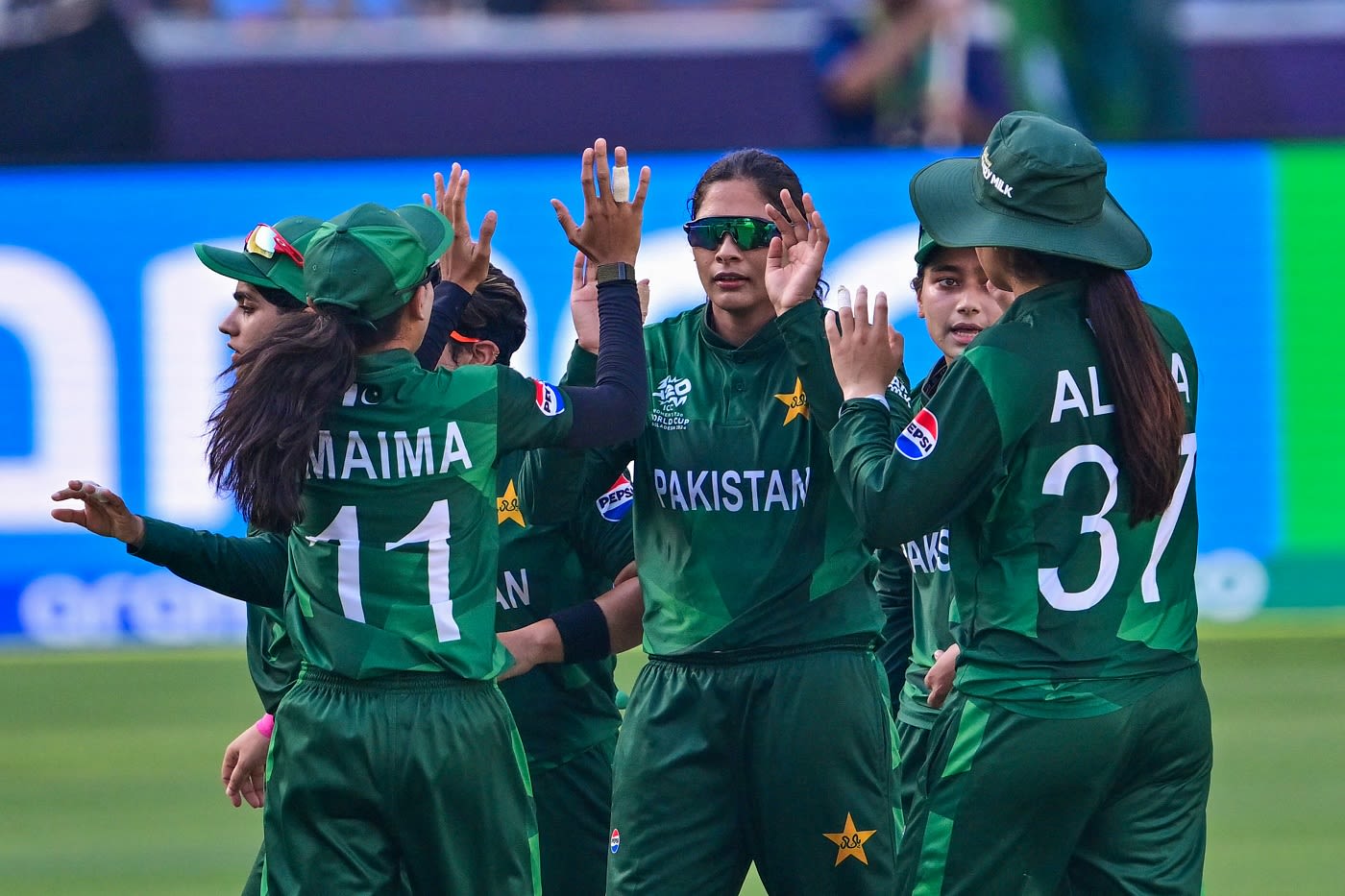 Pakistan players celebrate the dismissal of Smriti Mandhana