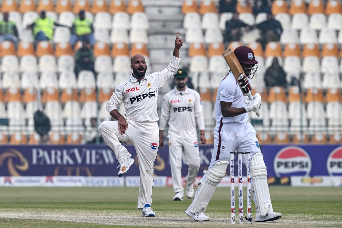 Sajid Khan celebrates after taking the wicket of Keacy Carty