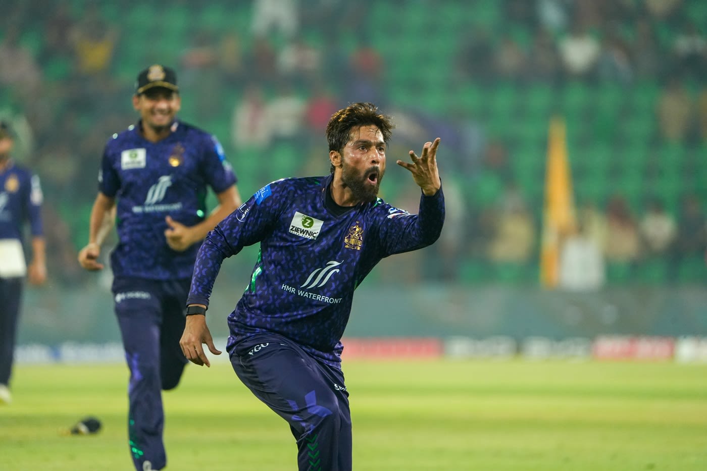 Mohammad Amir celebrates after getting rid of Babar Azam
