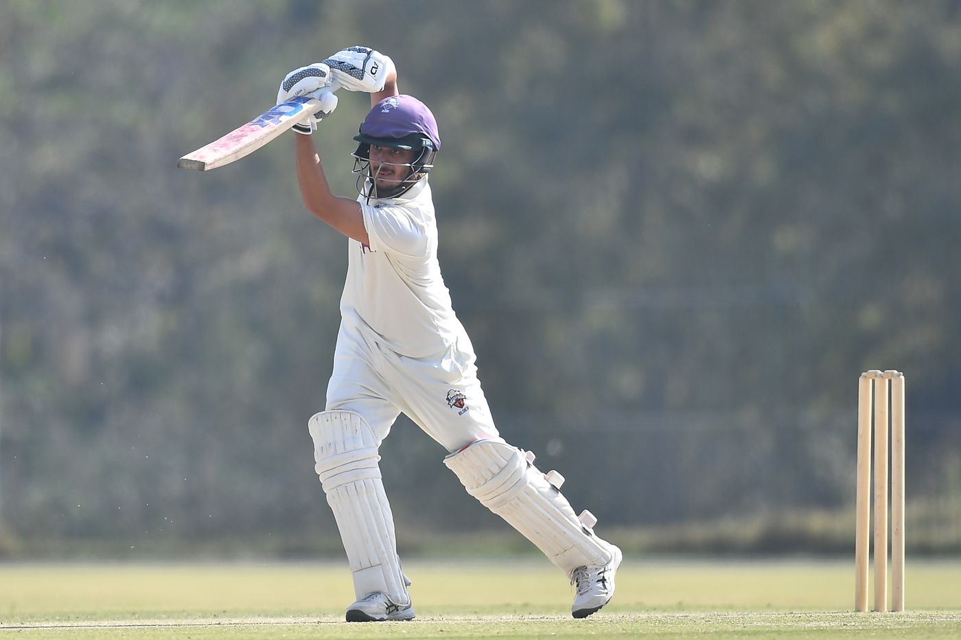 Saad Baig drives a ball during his innings