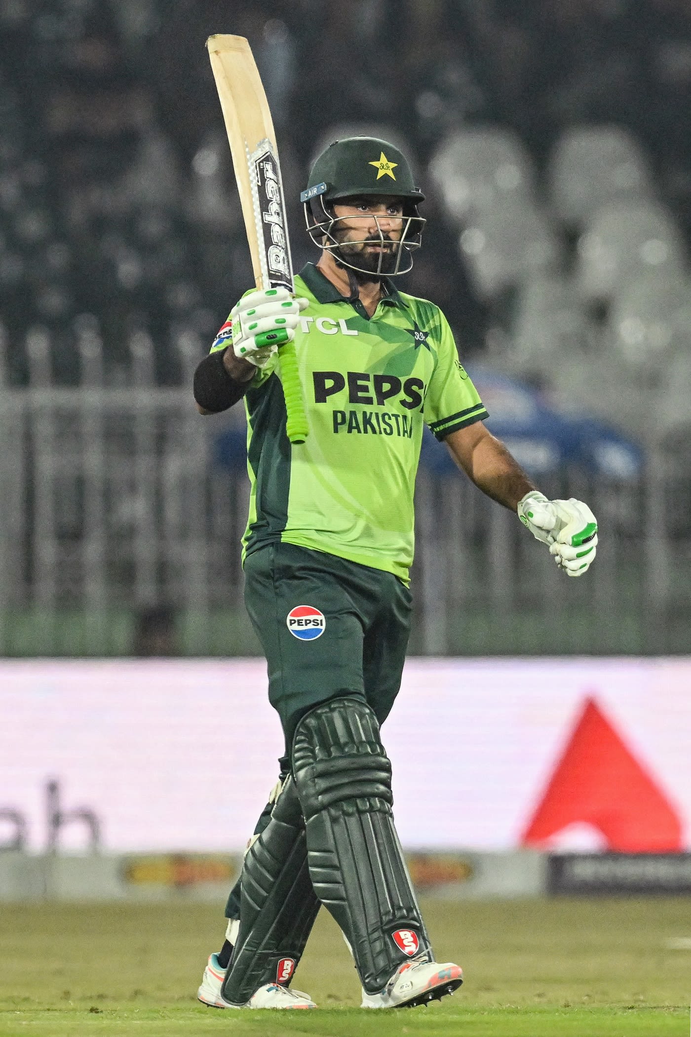 Hussain Talat celebrates his first 50-plus score in ODI cricket