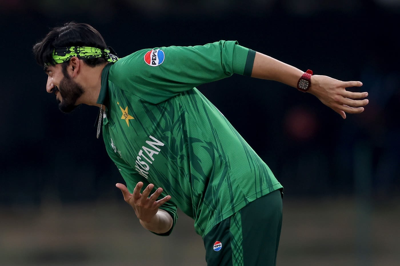 Usman Tariq celebrates with a bow