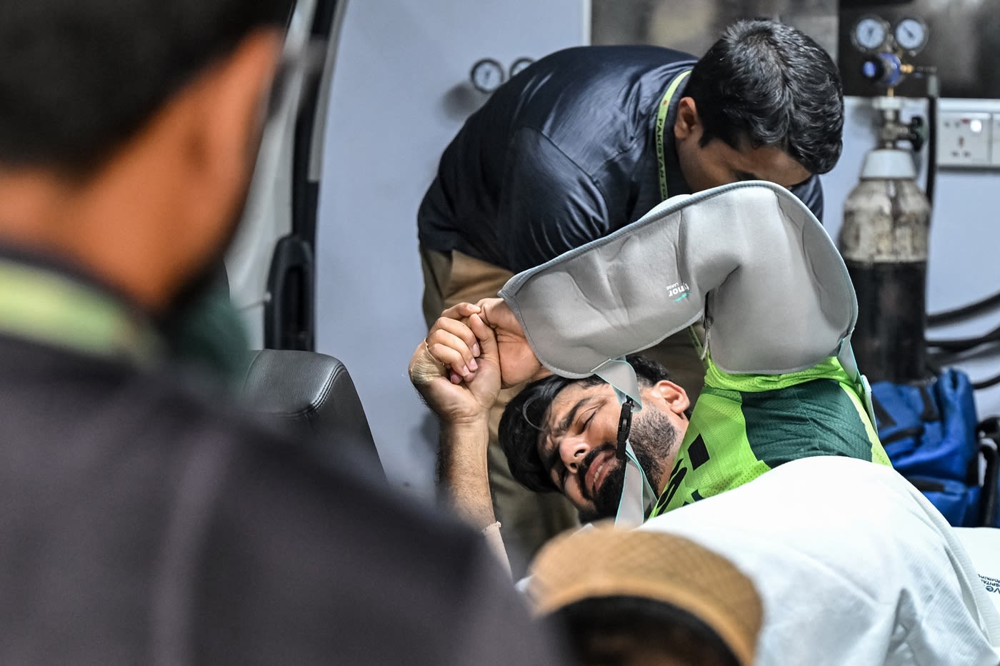 Hussain Talat is stretchered off the ground after picking up an injury