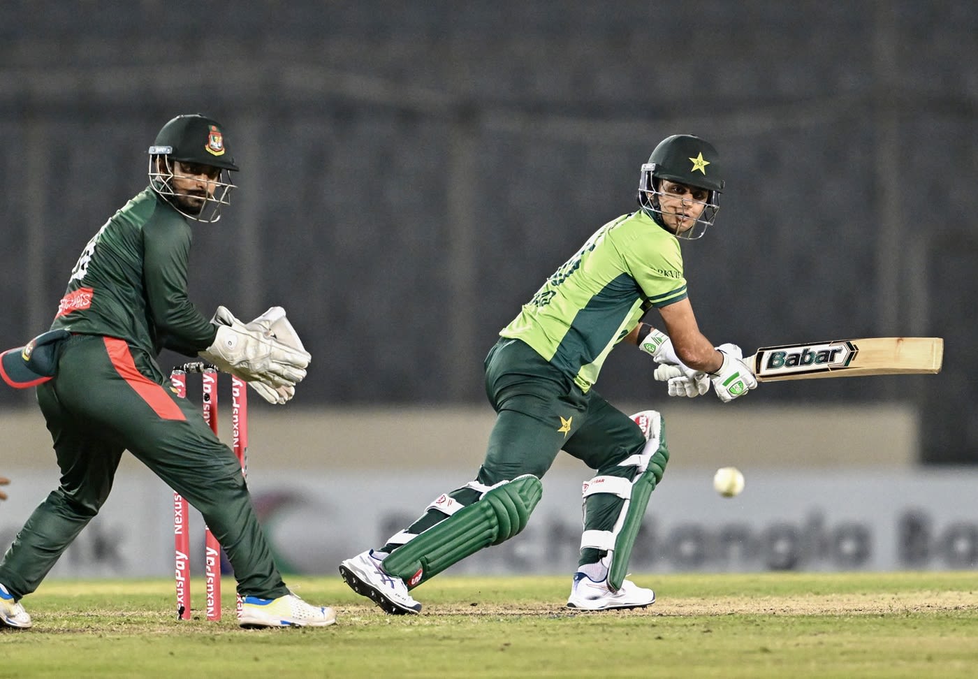 Saad Masood guides the ball away